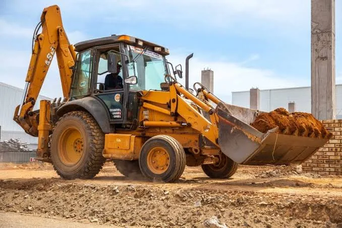 Backhoe loader working on a building site